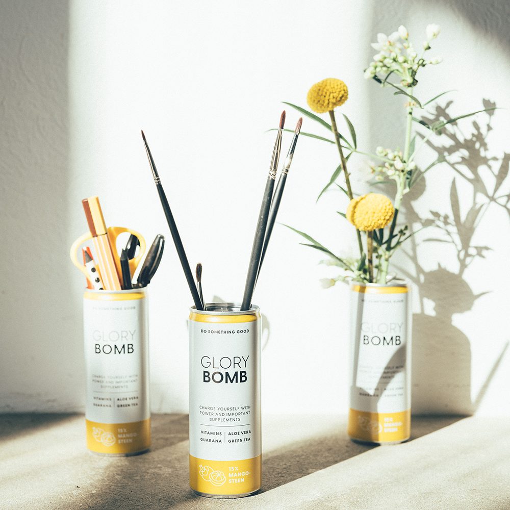 bild-drei-dosen-glory-bomb-blumen.png